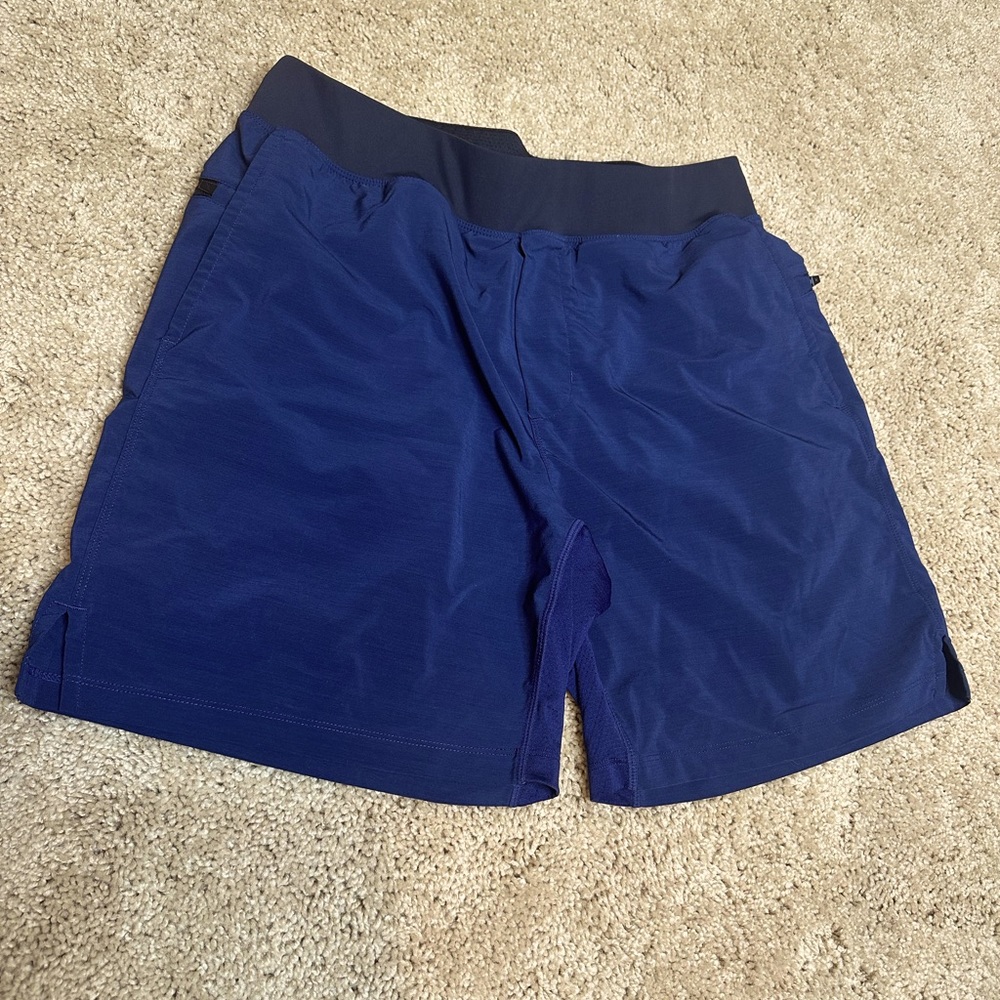 Fabletics Men’s workout shorts - Size large minimally used in great condition.